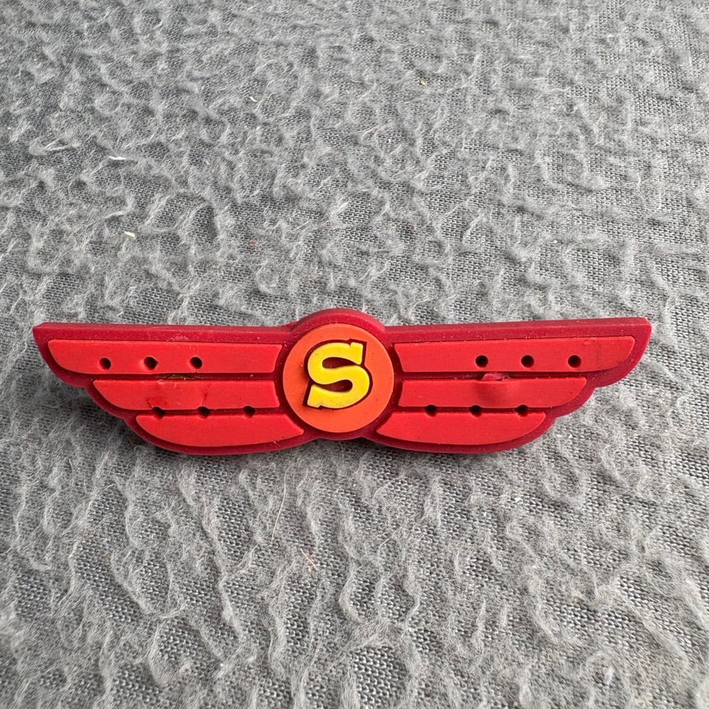 Red Superhero S Winged Lapel Pin Rubberized Comic Style Accessory